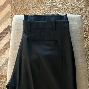 Nike performance pants NWT - Size 38 waist length needs to be hemmed to size.